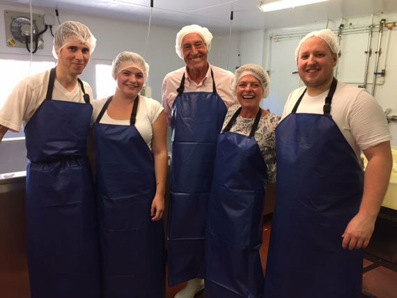 Len and Janet were almost unrecognisable in their protective clothing and mesh hats worn during the cheesemaking session - Len Goodman (centre), Janet Ellis (right) with Lyburn’s cheesemakers James Brown (right) and Steve Inder and Amyn Parker (left).